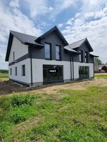 Nowy dom z garażem w zabudowie bliźniaczej w Łęgu Tarnowskim. — Żabno